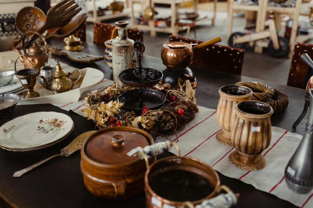 pexels-photo-6826026-6826026 Charming collection of antique kitchenware and decor on display indoors, exuding vintage elegance.